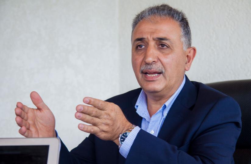 Beyhan Nakiboglu , the chief executive officer of Culligan Eastern African and Central Asia, speaks to The New Times at his residence in Kigali last Thursday. (Faustin Niyigena)