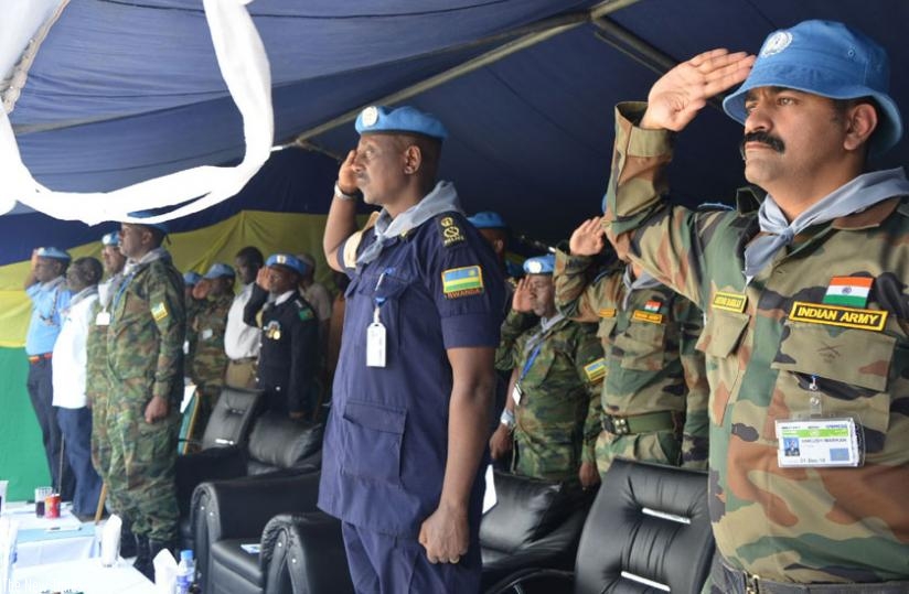 ACP Rogers Rutikanga (C), the commander of Formed Police Unit in UNMISS, South Sudan, with other officers at the Genocide commemoration event in Malakai, South Sudan, yesterday. (Courtesy)