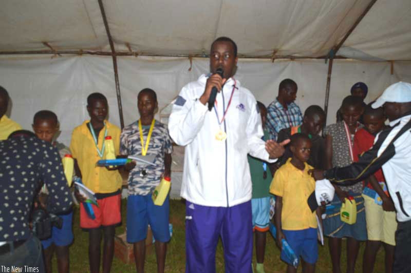 Serge Gasore after awarding the best upcoming stars in athletics in Ntarama Sector, Bugesera District. (Courtesy)