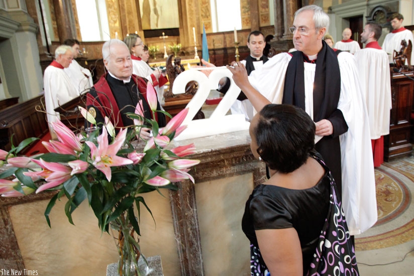 Lighting a candle of hope in memory of the victims. (Courtesy)