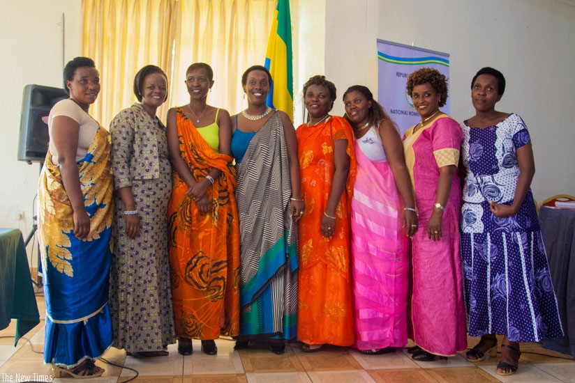 Incoming executive committee for National Women Council in a picture with Minister Gashumba (fourth from left). (Faustin Niyigena)