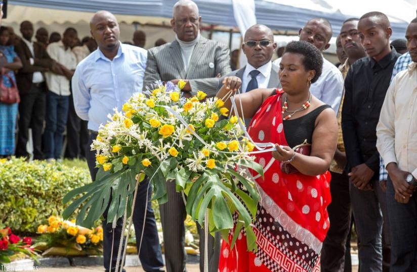 Christine Mukabunane, the spokesperson of the National Forum for Political Organisations, lays a wreath at Rebero Memorial site in Kicukiro District yesterday to pay tribute to pol....