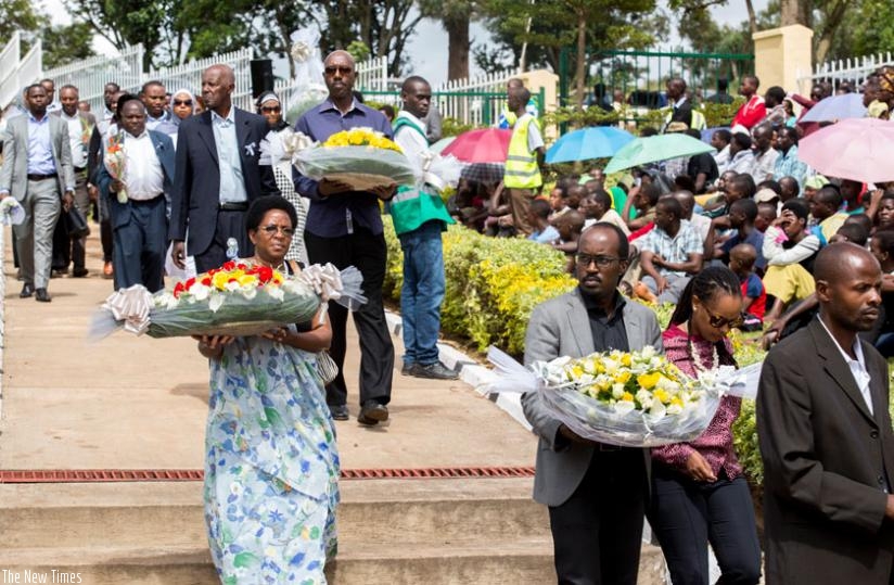 Relatives take wreath to Rebero Memorial site to pay tribute to their loved ones. (Courtesy)
