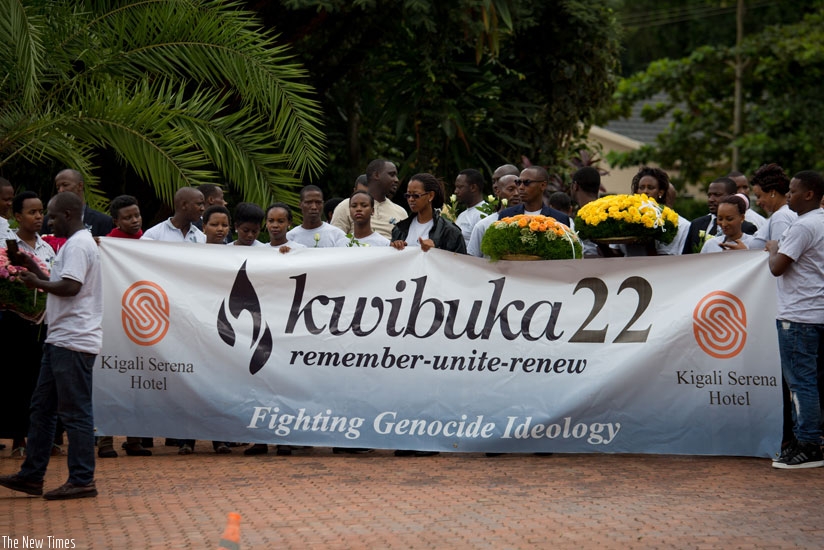 Kigali Serena Hotel employees at the Kigali Genocide Memorial Centre. Rwandan legislators are calling on other countries to enact laws against genocide ideology. (Timothy Kisambira)