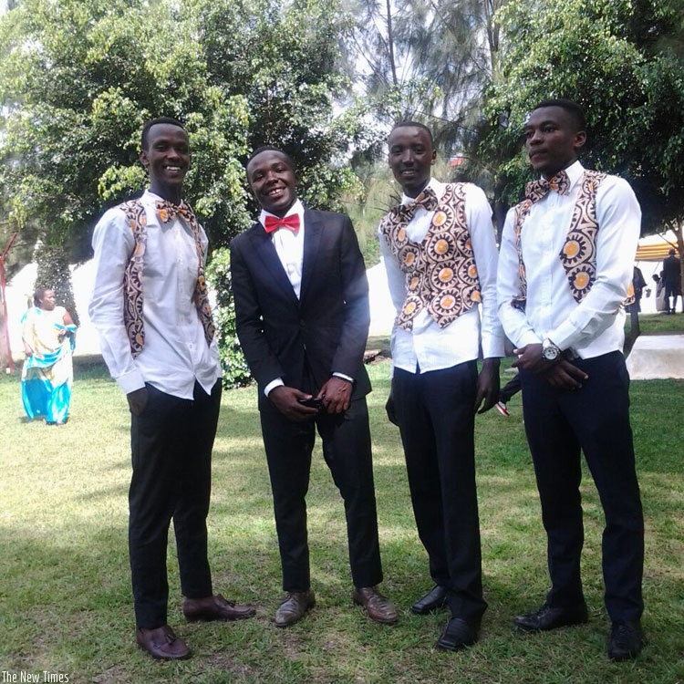 Ishimwe (second left) and some of the youth they work with at The Fabulous Entertainers and Events Management. (Pontian Kabeera)