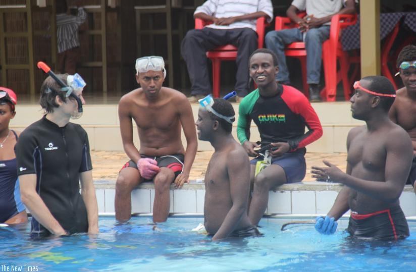 RUWHC players take a break during the game against Gruppo Sub Ospedale of Tanzania at Cercle Sportif de Kigali. (Jejje Muhinde)