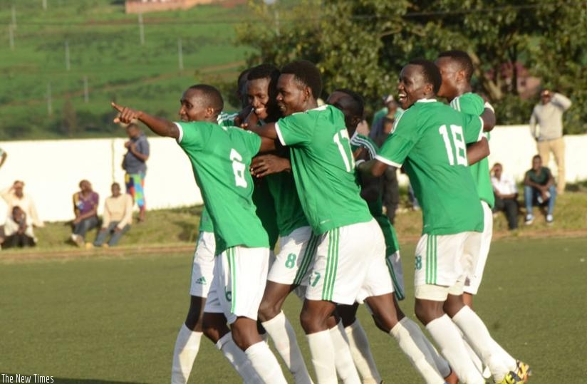 SC Kiyovu players celebrate a goal against Espoir FC. (Sam Ngendahimana)