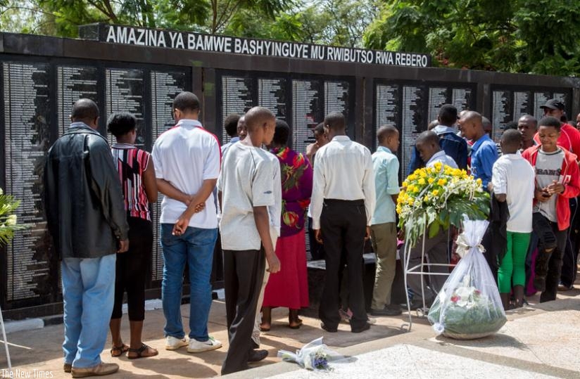 Mourners view names of people who were killed during the 1994 Genocide against the Tutsi that are laid at Rebero Memorial site while marking the end of the commemoration week yeste....