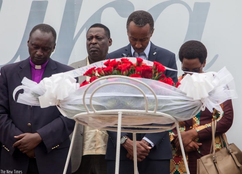 Rev. Bilindabagabo (L), PEACE Plan Rwanda Executive Director Eric Munyemana, and other religious leaders pay tribute  to the victims of the Genocide against the Tutsi at Kigali Gen....