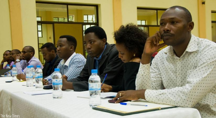 Participants follow proceedings at the workshop in Kigali yesterday. (Teddy Kamanzi)