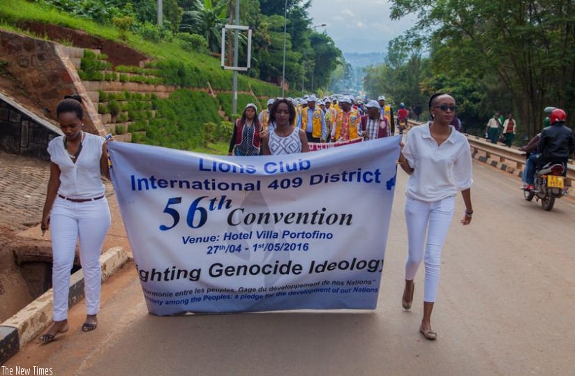 Lions Club International 409 District (Burundi, DR Congo and Rwanda) members participate in a Walk to Remember in commemoration of the Genocide in Kigali, yesterday. (Faustin Niyigena)