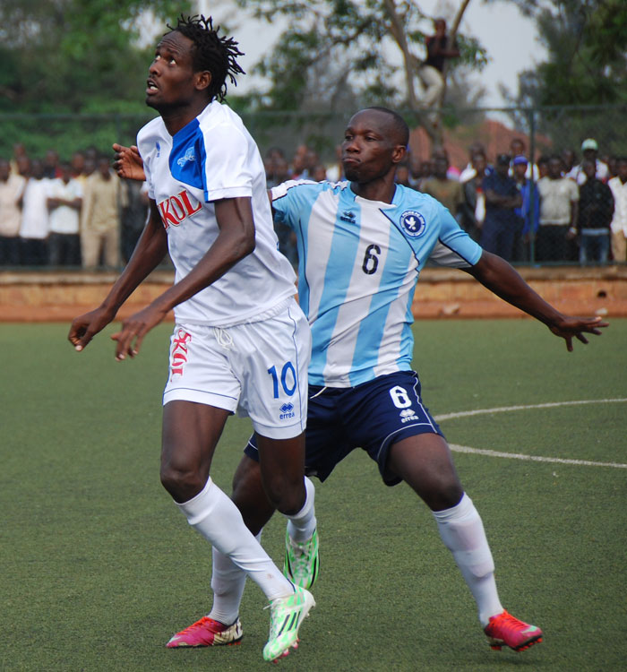 Rayon Sports' striker  Kasirye battles with Police FC defender Fabrice Twagizimana during the corresponding fixture which ended 1-1. (File)