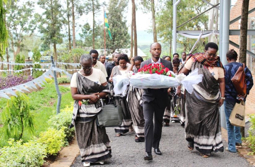 Action Aid staff arrive at Ntarama Genocide Memorial Site to pay tribute to victims of the 1994 Genocide against the Tutsi. (Frederic Byumvuhore)