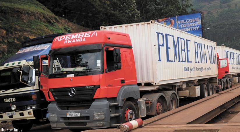 Trucks at Gatuna border post awaiting clearance. The COMESA yellow card will help cover third-party liabilities and medical expenses for the driver of the vehicle and his passenger....