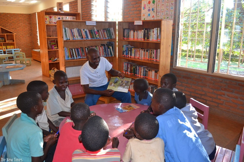 Children take part in an open reading session at the library. (Lydia Atieno)