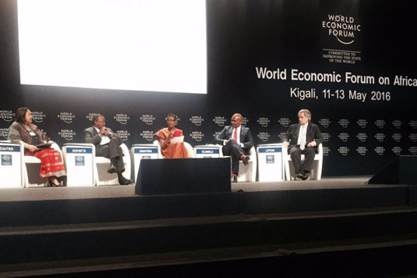 Moderator, Frannie Leautier (L) and panelists (L-R)  Uhuru Kenyatta, Winnie Byanyima, Tony O. Elumelu and David A. Lipton earlier today.