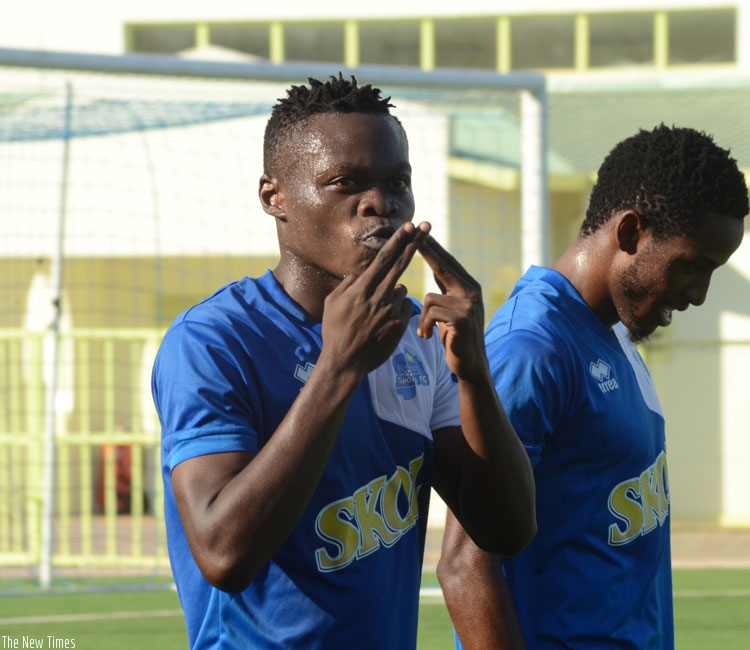 Pierrot Kwizera celebrates with a gesture after scoring the second goal in a game Rayon won 4-0 at Kigali Regional Stadium. (S. Ngendahimana)