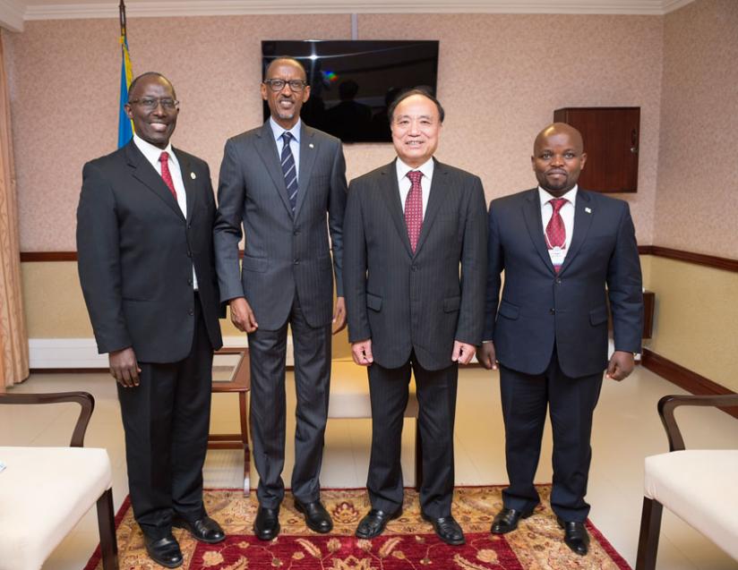 President Kagame with Houlin Zhao (2nd left), the Secretary General of the International Telecommunication Union (ITU), who was accompanied by Andrew Rugege (L), the ITU Regional D....