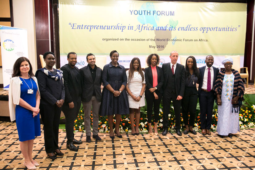 First Lady, speakers, panelists and guests pose for a group photo. (Courtesy photos)