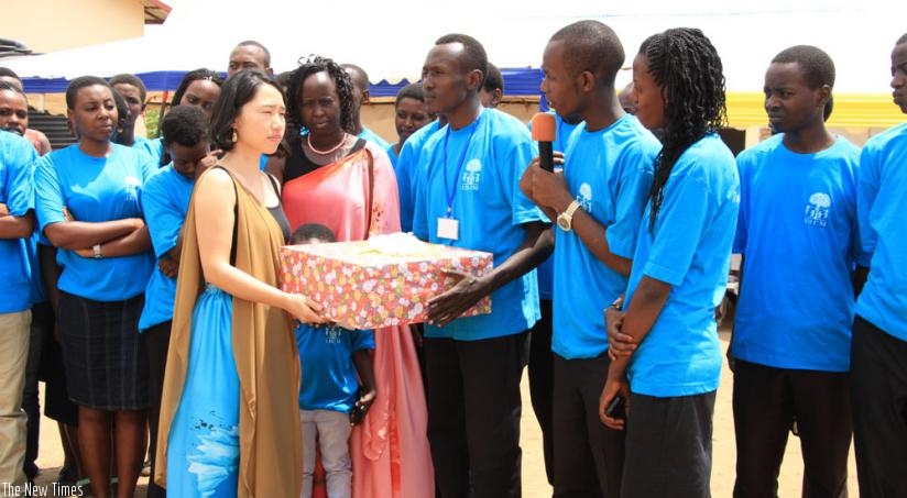 Some of the students give presents to their benefactors, including Yuiko. (Kelly Rwamapera)