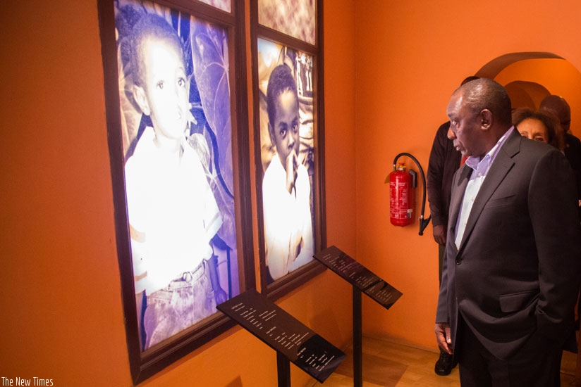 South African Deputy President Cyril Ramaphosa reads profiles of children victims at Kigali Genocide Memorial Centre in Gisozi yesterday. (Timothy Kisambira)
