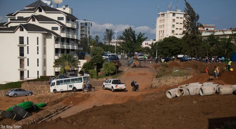 Construction works on part of the bypass at Kigali Convention Centre. Completion of the project has been delayed by late expropriation, authorities say. (Timothy Kisambira)