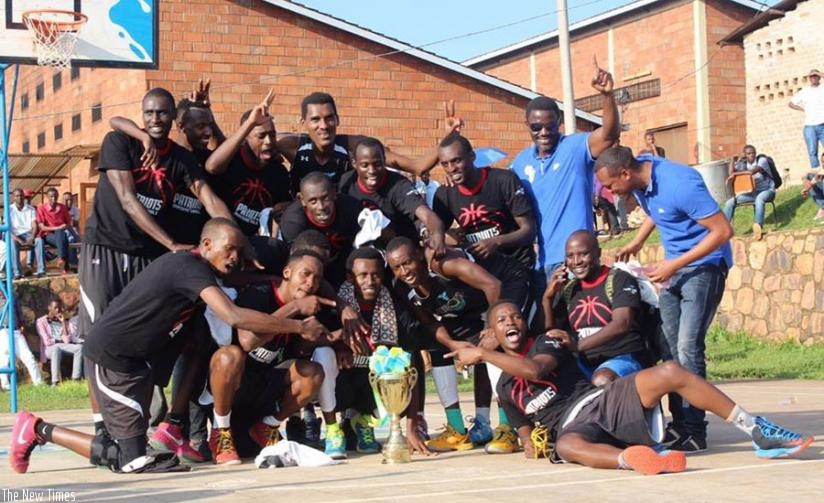 Patriots players celebrate their first league title. (Geoffrey Asiimwe)