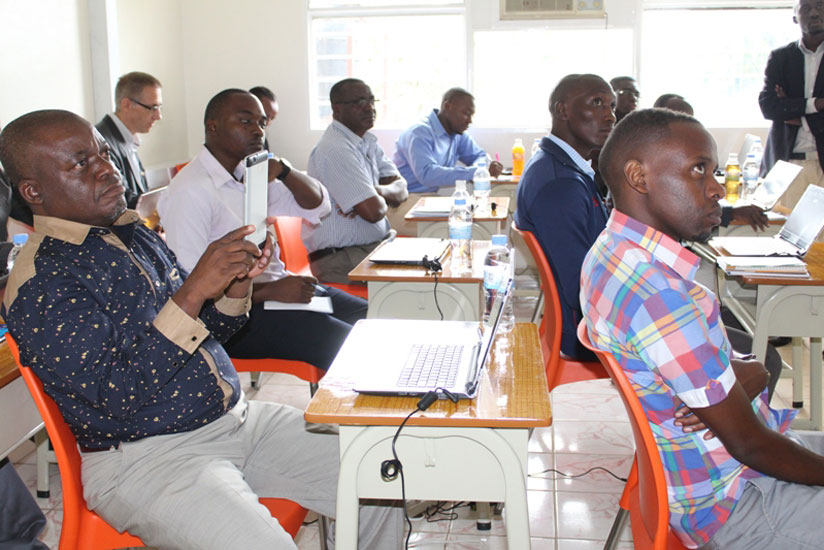 Teachers attend the training on smart classrooms yesterday. (Solomon Asaba)