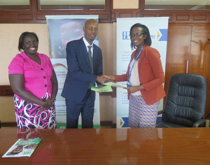 L-R: Judith Aguga, the AFR Technical Director, Charles Kayumba, the MD of Duterimbere IMF and Dr Diane Karusisi, the CEO of Bank of Kigali. (Anitha Kirezi)