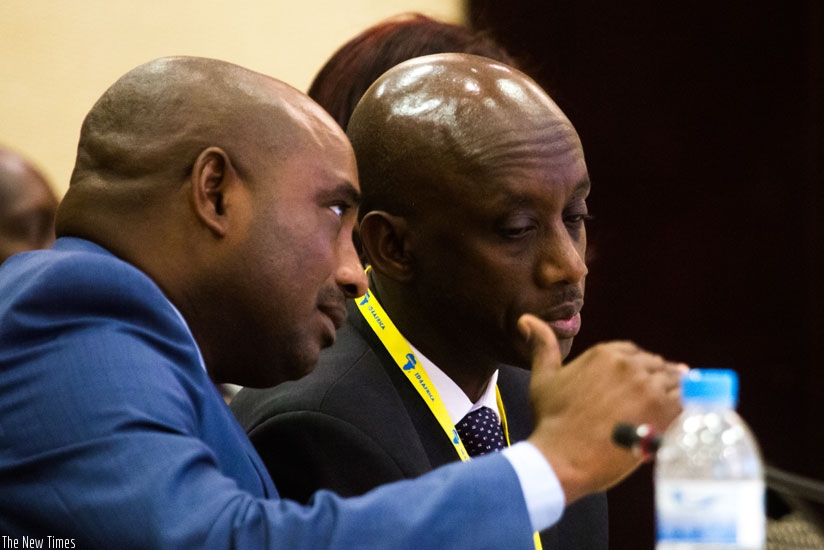 Nyamulinda (L) chats with Kaboneka during the meeting in Kigali yesterday. (T. Kisambira)