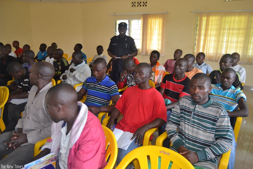 Chief Superintendent Murenzi Sebakondo addressing the ex-combatants in Mutobo. (Courtesy photo)