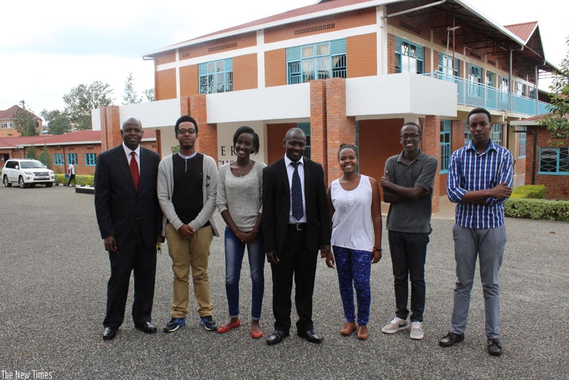 The lucky students pose for a picture with their head teacher and deputy head teacher. (Lydia Atieno)