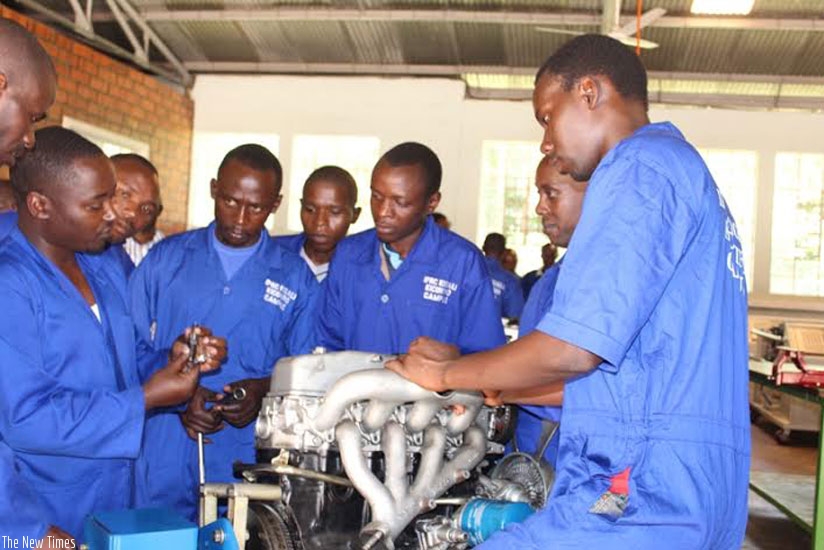 Vocational students get training on how a car engine works. (Pontian Kabeera)