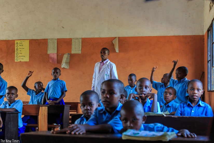 Pupils in a classroom. Teachers should encourage slow learners to participate in class activities more. (Julius Bizimungu)
