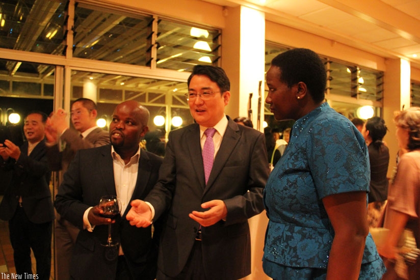 L-R- Minister for Youth and ICT Philbert Nsengimana, Korean Ambassador to Rwanda Park Yong-min and Minister for Sports and Culture Julienne Uwacu, during the exhibition yesterday.