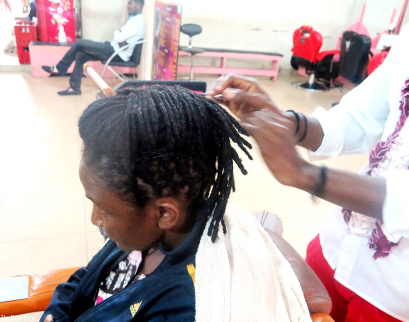 Twisting dreadlocks is one way to style them. (L. Atieno)