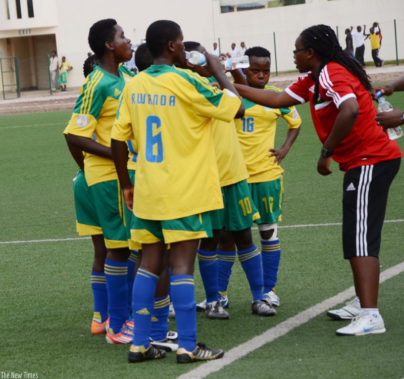 Coach Grace Nyinawumuntu talks with players during national duty. (File)
