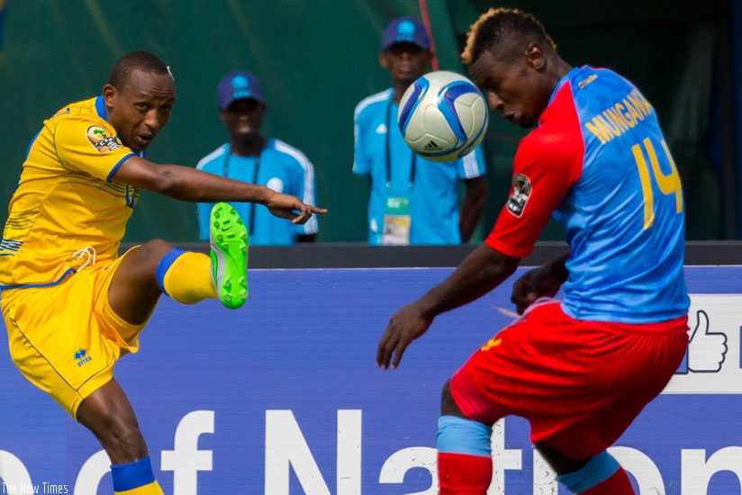 Congolese Nelson Munganga intercepts Jean-Claude Iranzi's pass at Amahoro Stadium in CHAN 2016. (File)