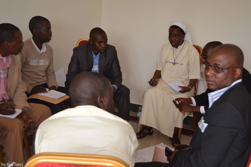 Educationists discuss the challenges and solutions to implement the skills lab and business clubs for entrepreneurship development in schools at the meeting in Kigali. (Emmanuel Ntirenganya)