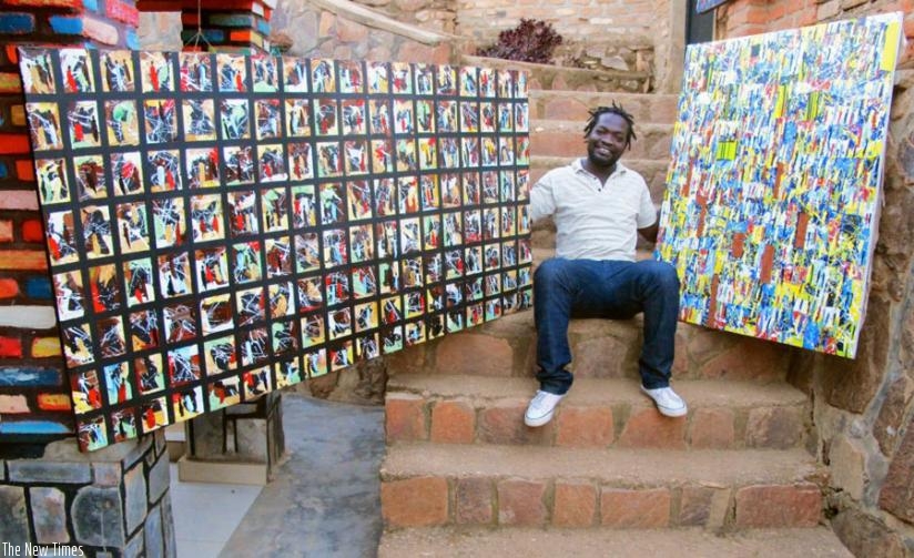 Jean Baptiste Mpungirehe displays some of his artworks. (Net photo)