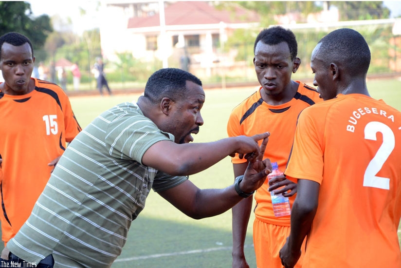 Bugesera coach Ali Bizimungu gives tactical instructions to his players during a previous league match. (File)