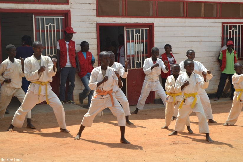 Refugee children at Mahama camp train in Karate on Wednesday. (Frederic Byumvuhore)