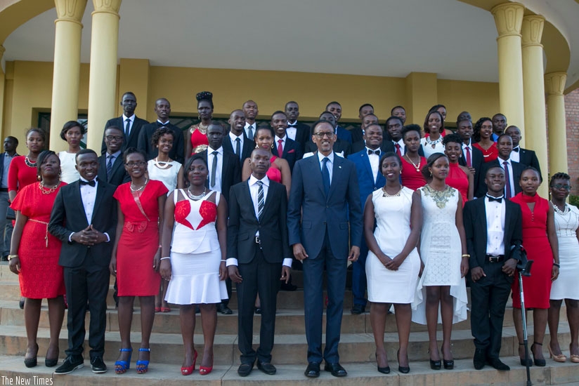 President Kagame with the students who have landed scholarships to study at some of the world's renowned universities and colleges through the Bridge2Rwanda Scholars programme at the commissioning ceremony in Kigali yesterday. (Village Urugwiro)