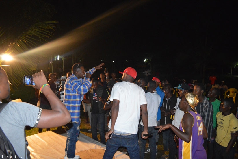 Bull dog and young tone entertain the few revellers who turned up. (Remy Niyingize)