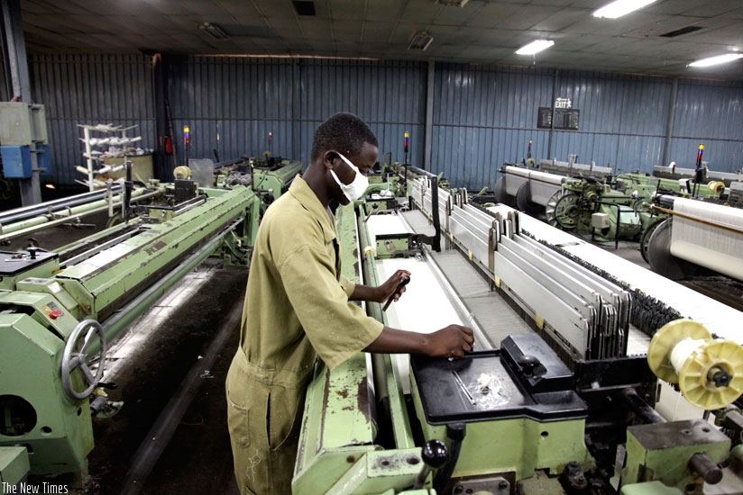 A worker at Utexrwa Textile Industry. The new Budget will promote Made-in-Rwanda products. (File)