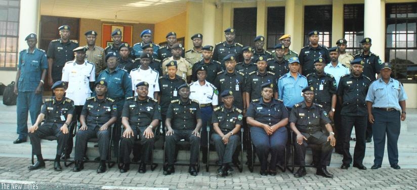 Police Senior Command and Staff Course students in a group with the NPC leadership (seated).