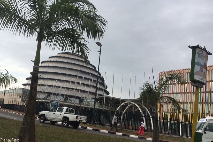 City residents walk by the Kigali Convention Centre, a landmark facility in Gasabo. The city will showcase investment opportunities it offers in S.Africa. 
