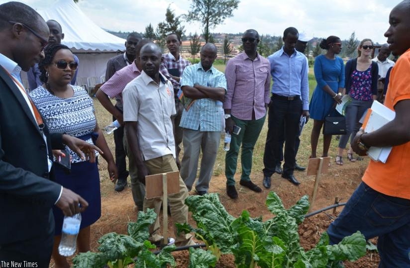 A cross-section of Kigali farmers learn how to grow vegetables at Balton demostration garden in Kacyiru. (Courtesy)
