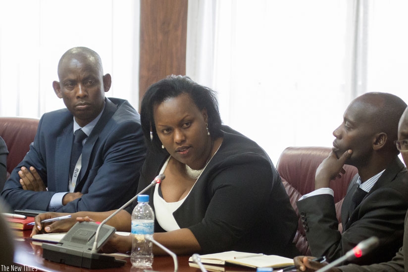 Kasangwa briefs journalists on the country's financial outlook recently. Timothy Kisambira)