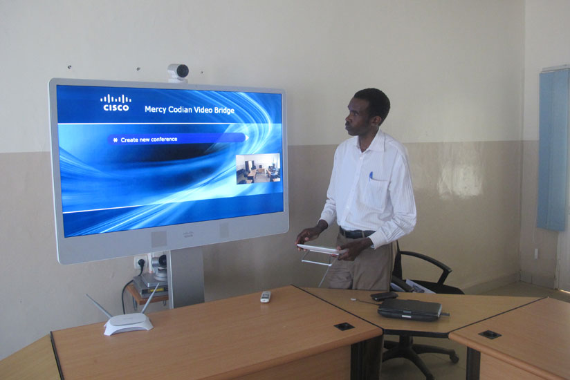 Nzabahimana explains how telemedicine sessions are conducted. (Solomon Asaba)